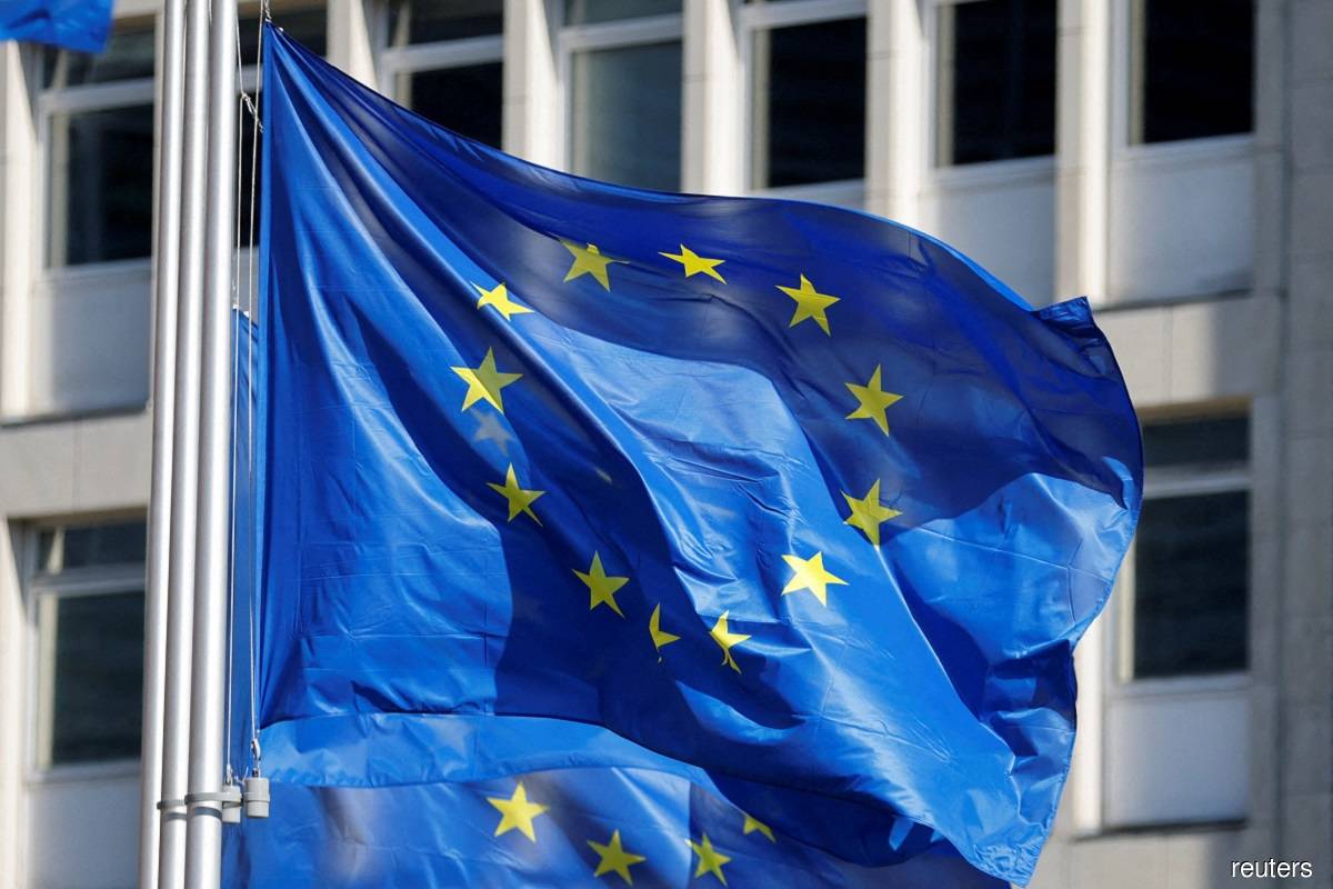  European Union flags fly outside the European Commission headquarters in Brussels March 1, 2023. (Reuters pic)